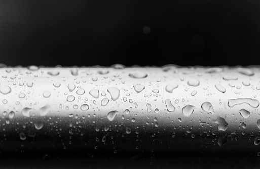 Rain Droplets Running Down Glass