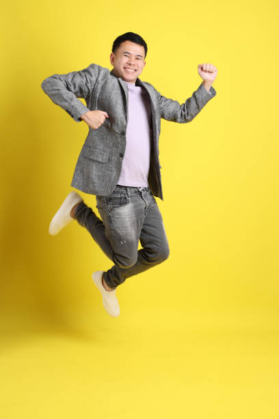 男性、スタイル - men businessman jumping levitation ストックフォトと画像