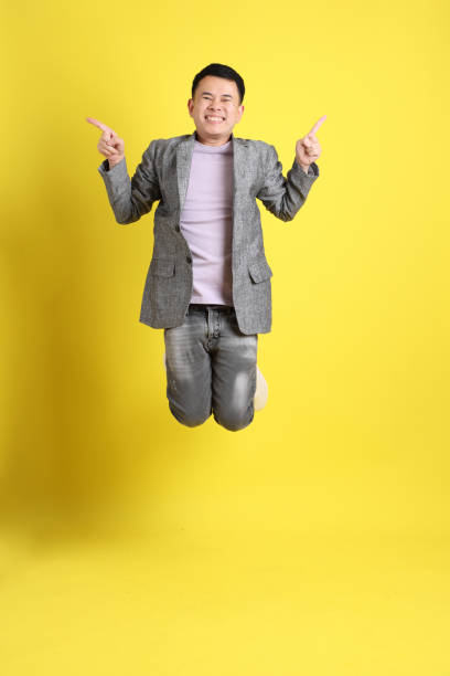 man with style - men businessman jumping levitation imagens e fotografias de stock