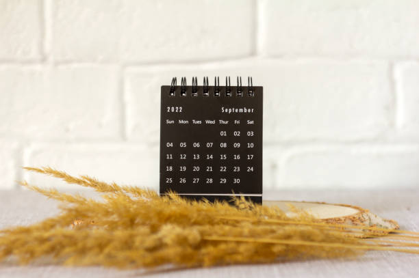 istock Desktop calendar for September 2022 on the table. 1408264603