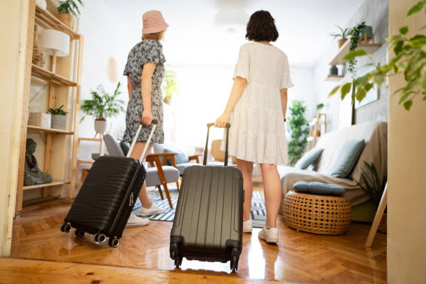 istock Female friends, tourists, arriving at their accommodation 1408268678