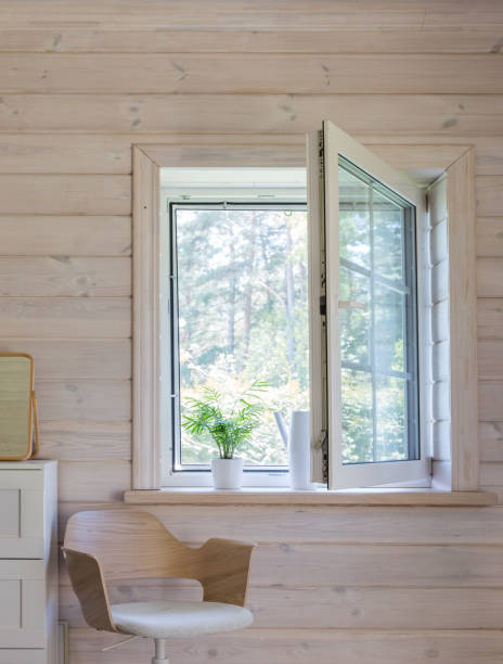 istock White window with mosuito net in a rustic wooden house 1408268854