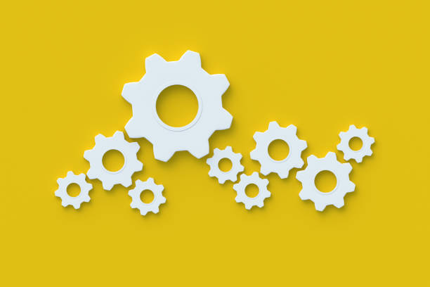 istock Lot of gears on yellow background. Engineering technology. Mechanism development. Industrial progress. Idea concept. Business cooperation. Teamwork and communication. 3d render 1408269214