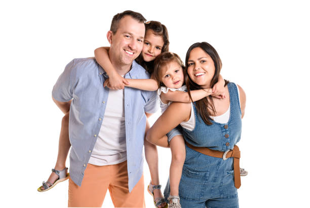 family with his two daughter girl on studio white background - couple indoors studio shot horizontal imagens e fotografias de stock