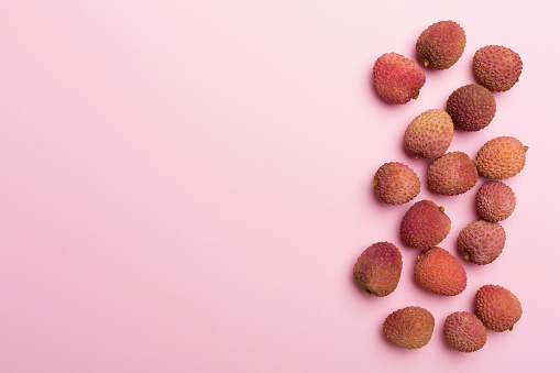 Lychee is a tropical fruit. The outer side of the fruit is pink-red, rough textured and soft shell. Lychee is a monotypic taxon and  the sole member in the genus \nLitchi in the soapberry family.sapindaceae.