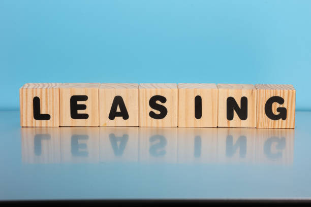 istock Wooden cubes with an inscription leasing 1408273433