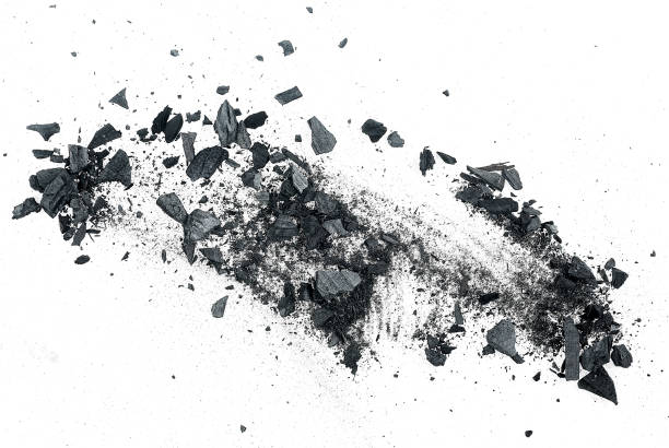 istock Particles of charcoal on a white background, top view. 1408274785