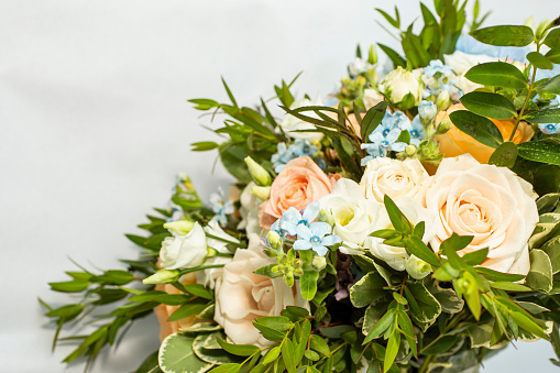crop of a bridal bouquet with white copy space. Soft focus close up photography