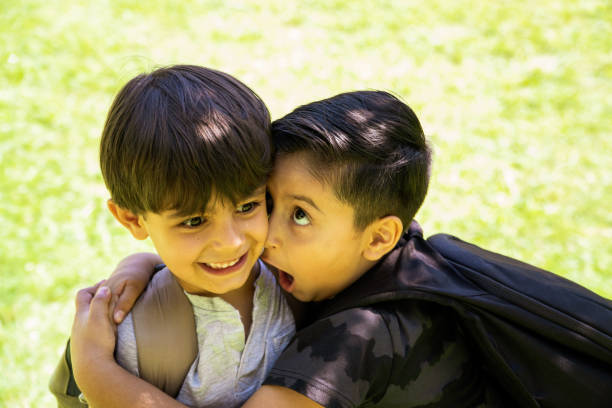 istock multiethnic children holding on together 1408277242