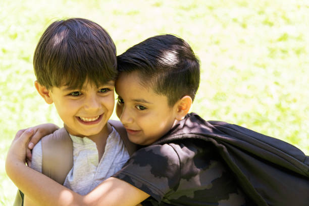 multiethnic children holding on together