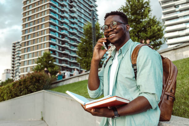 istock Young African American man talking on the phone 1408277838