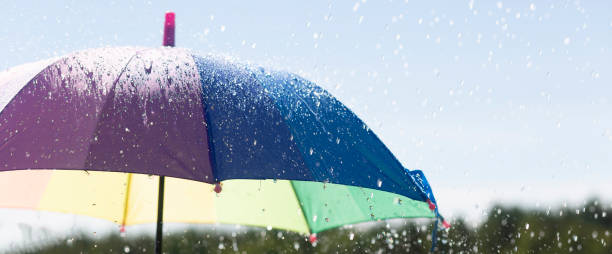 istock Colorful umbrella and summer rain. 1408277877
