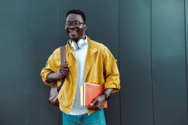 istock Smiling African American man holding his books 1408278537