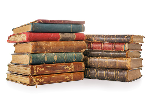 Pile of old books isolated on white, clipping path included