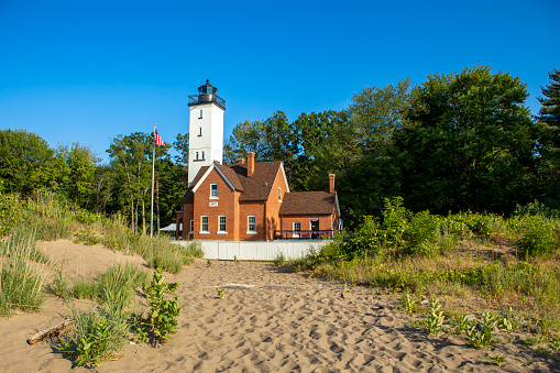The historical Presque Isle Lighthouse on the shore of lake Erie in Presque Isle State Park in Erie, Pennsylvania, USA.