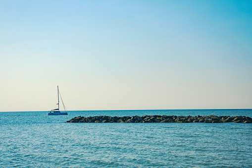 A boat sailing on the waters of Lake Erie in Presque Isle State Park, Erie, Pennsylvania, USA.