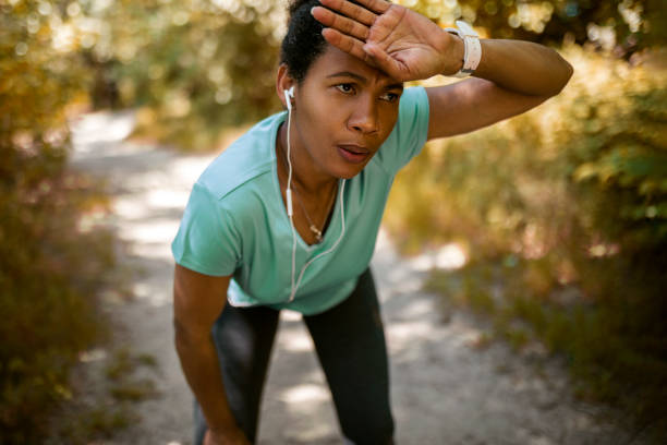 istock African American woman runner taking a break 1408285994