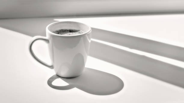 The concept of news. Newspaper, a Cup of morning coffee on the background of the summer Park.