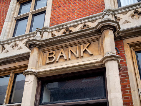 Sign above the doorway of a Victorian bank.