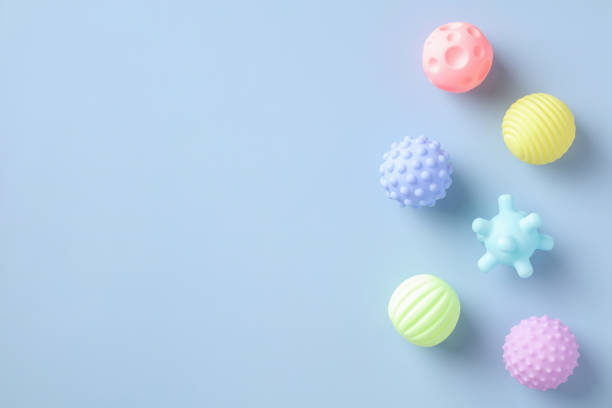 istock Colorful baby bathing toys on blue table. Flat lay, top view. 1408291944