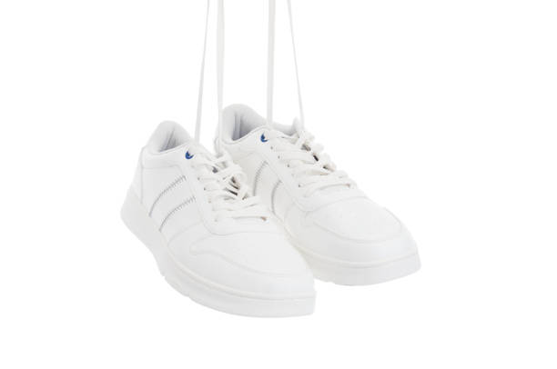istock Pair modern sport sneakers close up isolated on white background 1408293168