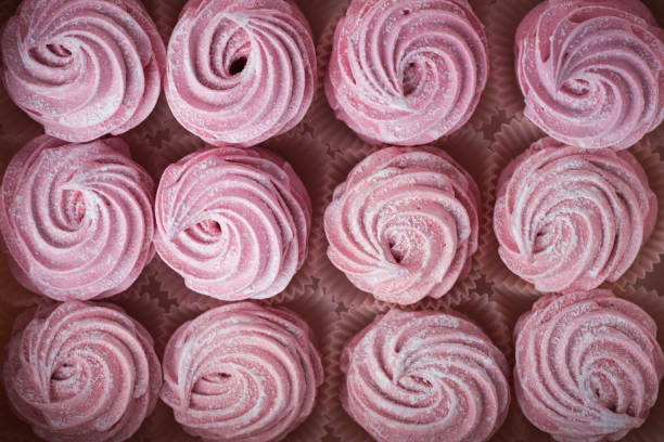 istock Flat lay of pink berry marshmallow. Zefir dessert with red currant mousse 1408295169