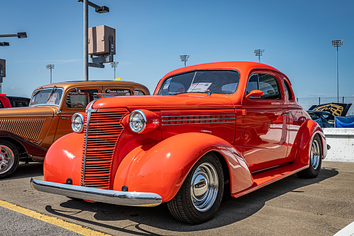 Lebanon, TN - May 14, 2022: Low perspective front corner view of a 1938 Chevrolet Master Coupe at a local car show.