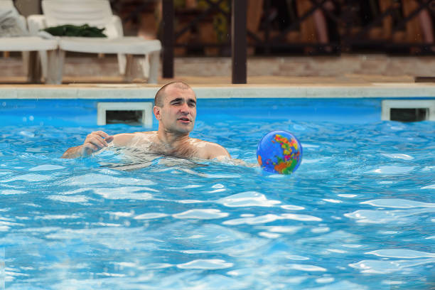 istock young people spend summer hot days in the pool water 1408297061