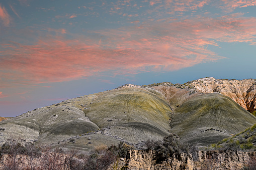 Badlands National Park panorama in South Dakota. Badlands protects sharply eroded buttes and pinnacles, along with the largest undisturbed mixed grass prairie in the United States.