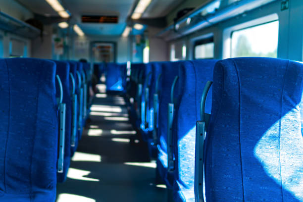 istock interior of commuter passenger train car 1408297739