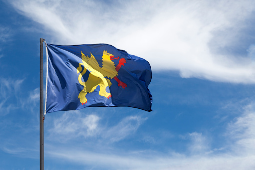 Flag of the city of Saint Brieuc waving un mid air.