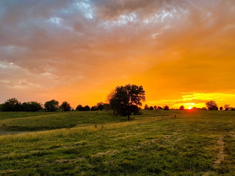 Beautiful dynamic sunset over farmland in Carroll County Missouri