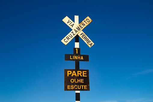 Silvânia, Goiás, Brazil – July 10, 2022:  Railroad crossing. 1 Track Railroad Crossing Sign. Railroad crossing sign.
