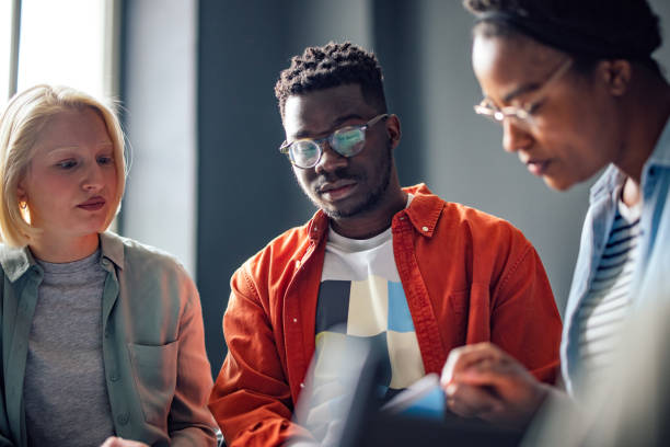 istock Portrait of Multi-Ethnic Cheerful Students Studying Together 1408304053