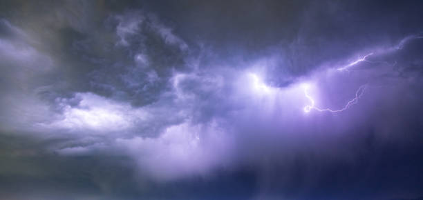 istock Lightning and clouds in the night storm 1408306131