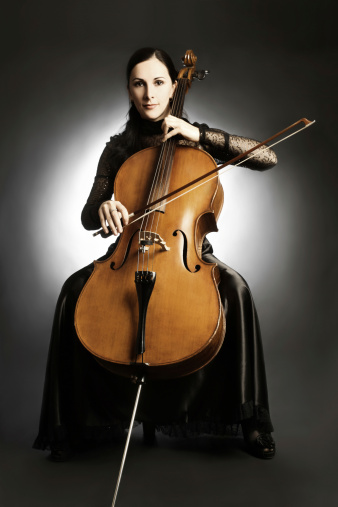 Cello classical musician cellist. Woman with musical instrument