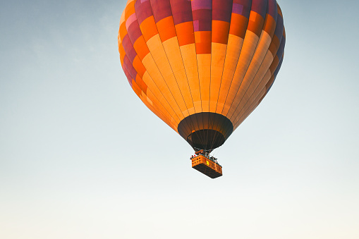 Scenic view of hot air balloons flying over Cappadocia in Turkey