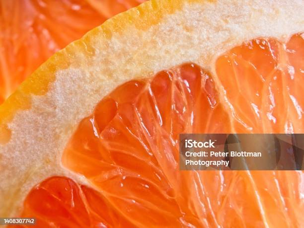 A Wholesome Slice Of Ruby Red Grapefruit A Vegan Food Packed With Vitamin C Stock Photo - Download Image Now