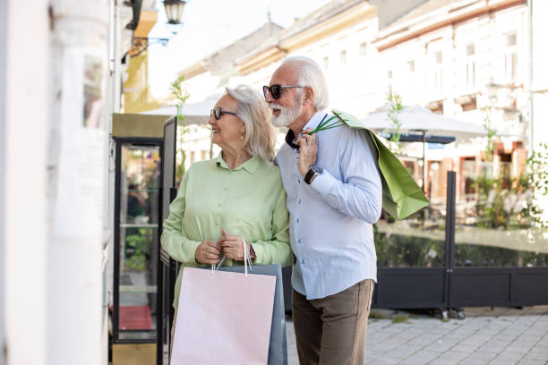 istock Senior couple on a shopping spree 1408308540