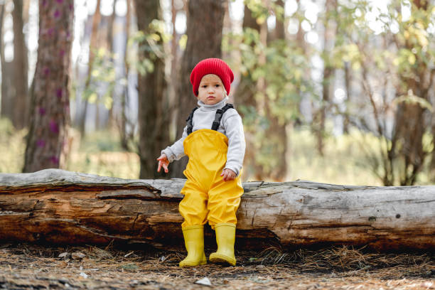 istock Little girl walking in the forest 1408309705