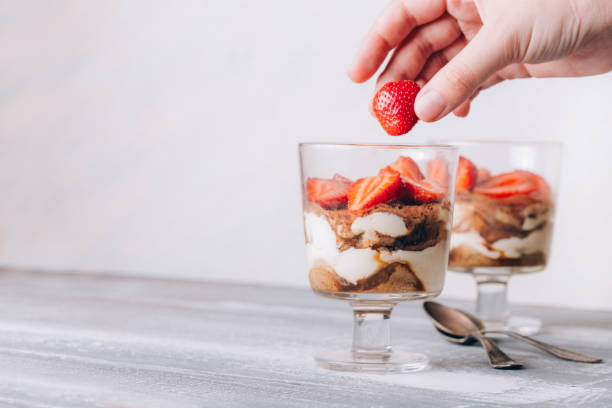 istock tiramisu in a glass with strawberries 1408311279