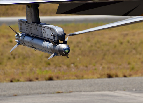 Florida, USA - May 12, 2012: A Sikorsky UH-60 Blackhawk operated by the Army Rangers. Troops are fast-roping to the ground.