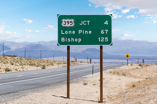 Route 395 to Lone Pine and Bishop highway sign on Route 14 near Mojave in Southern California.