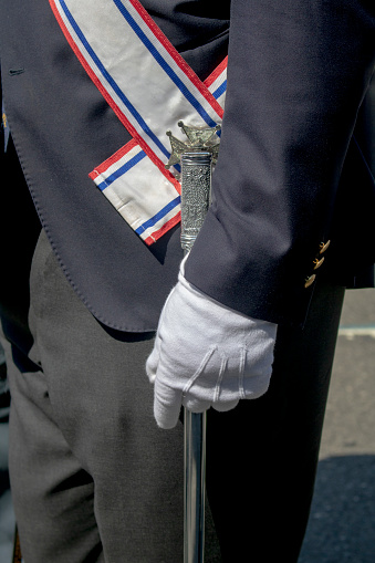 Man with white glove and military soldiers uniform