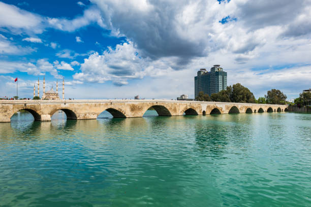 Stone bridge (Taşköprü in Turkish) in Adana, Turkey. The bridge is historically known as Ponte Sarus and a Roman bridge spanning the Seyhan River in Adana.