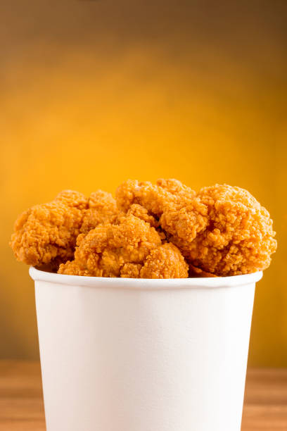 istock Crispy fried chicken in the bucket. Chicken bucket. 1408337793