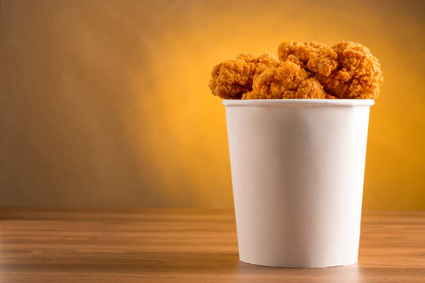 istock Crispy fried chicken in the bucket. Chicken bucket. 1408337794
