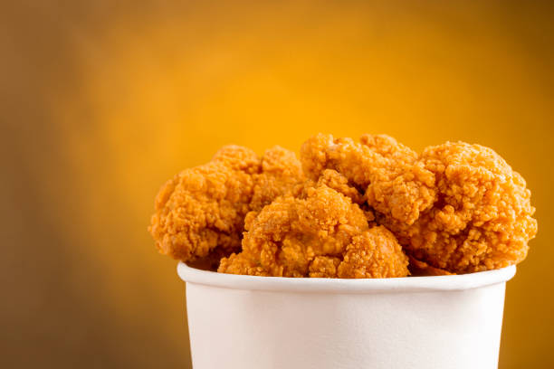 istock Crispy fried chicken in the bucket. Chicken bucket. 1408337795