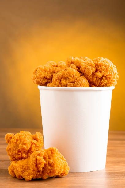 istock Crispy fried chicken in the bucket. Chicken bucket. 1408337807