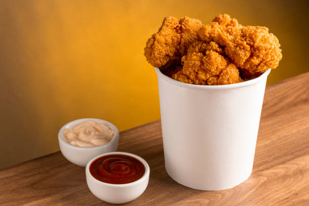 Crispy fried chicken in the bucket. Chicken bucket.